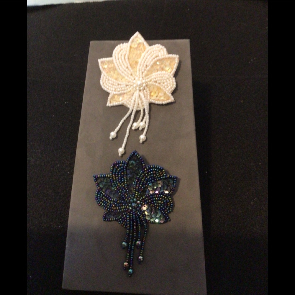 Pair of Black and White Flower Brooches w iridescent beads and sequins.